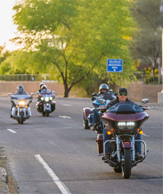 Group of Motorcyclists Riding with Wild Horse Pass