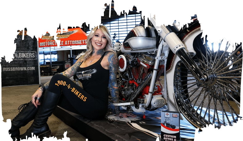 Russ Brown Motorcycle Attorneys next to giveaway motorcycle